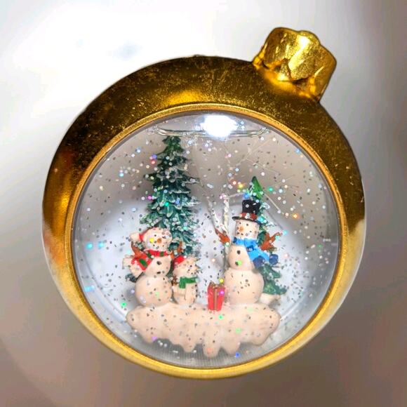 Festive Illuminated Musical Snow Globe Snowman Family Golden Christmas Ball - Picture 1 of 7